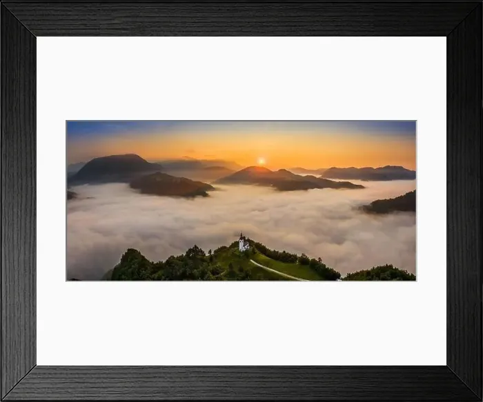 Framed Print : Sebrelje, Slovenia - Aerial panoramic drone view of the beautiful hilltop church of St