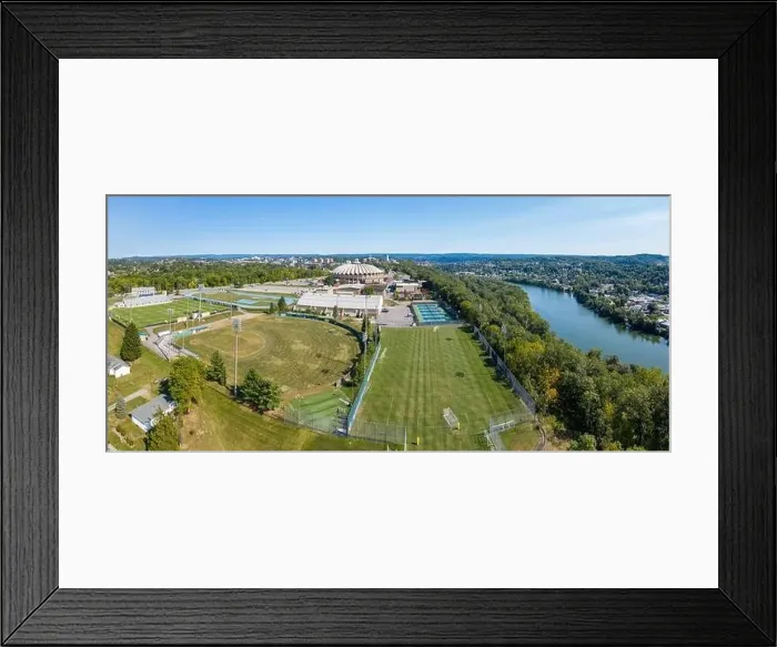 Framed Print : Morgantown, WV - 22 September 2020: Aerial panorama of the WVU Coliseum sports arena on Evansdale campus of university Framed Print : Morgantown, WV - 22 September 2020: Aerial panorama of the WVU Coliseum sports arena on Evansdale campus of university