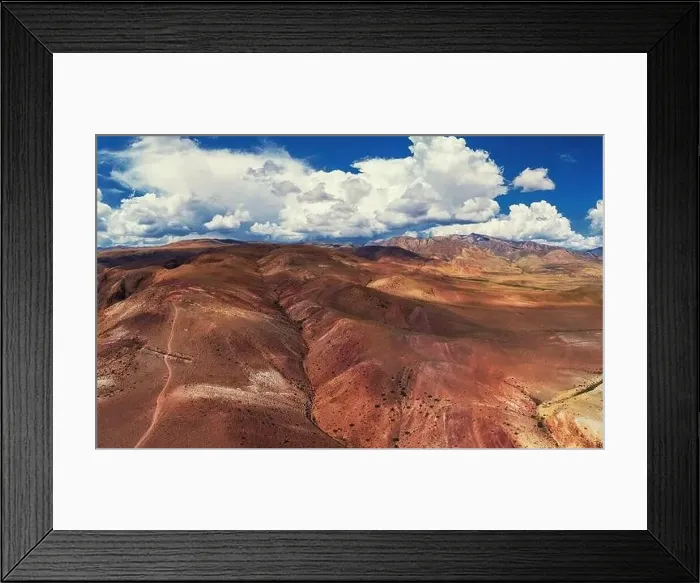 Framed Print : Aerial shot of the textured yellow nad red mountains resembling the surface of Mars Framed Print : Aerial shot of the textured yellow nad red mountains resembling the surface of Mars