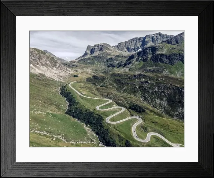Framed Print : Drone photo of winding roads on Julierpass in Switzerland Framed Print : Drone photo of winding roads on Julierpass in Switzerland