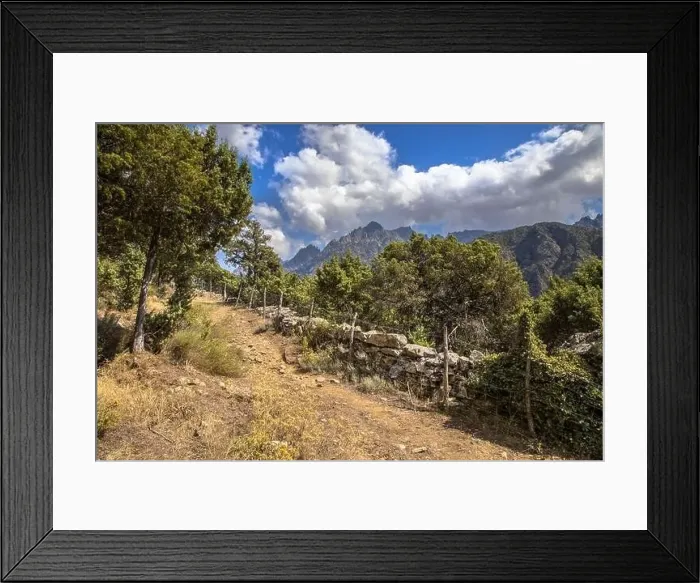 Framed Print : Walking track in Asco river gorge with view on Cinto mountain in Haute Corse on corsica island, France Framed Print : Walking track in Asco river gorge with view on Cinto mountain in Haute Corse on corsica island, France