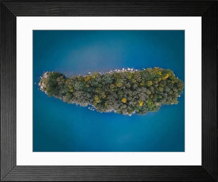 Framed Print : Aerial drone shot of tree covered island Framed Print : Aerial drone shot of tree covered island
