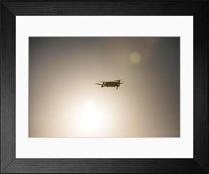 Framed Print : Color image of a drone flying at sunrise Framed Print : Color image of a drone flying at sunrise