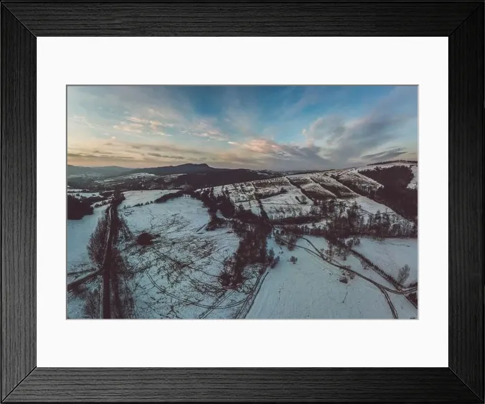 Framed Print : Lower Beskid, Carpathian Mountain Range in winter aerial view, orange and pink sky