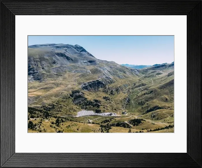 Framed Print : Light blue cloudless sky over long narrow footpaths surrounded by mountain slopes covered with trees and verdant grass Framed Print : Light blue cloudless sky over long narrow footpaths surrounded by mountain slopes covered with trees and verdant grass