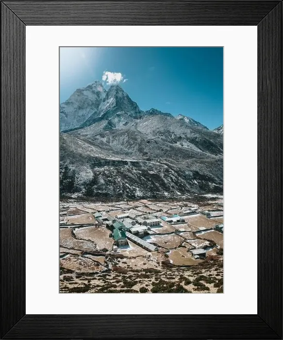 Framed Print : From above amazing view of small settlement located in desert valley against rough rocky mountains under blue sky Framed Print : From above amazing view of small settlement located in desert valley against rough rocky mountains under blue sky