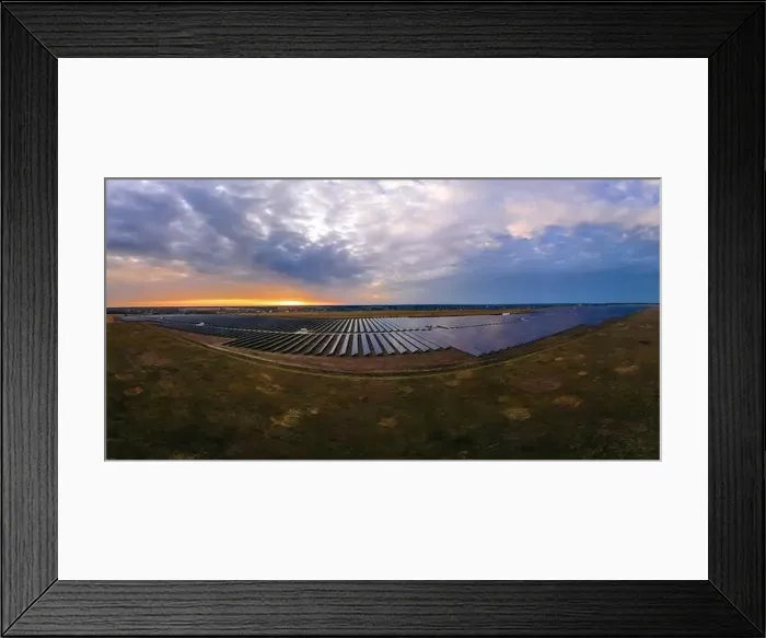 Framed Print : Aerial panorama view of large solar panels at a solar farm at bright summer sunset Framed Print : Aerial panorama view of large solar panels at a solar farm at bright summer sunset