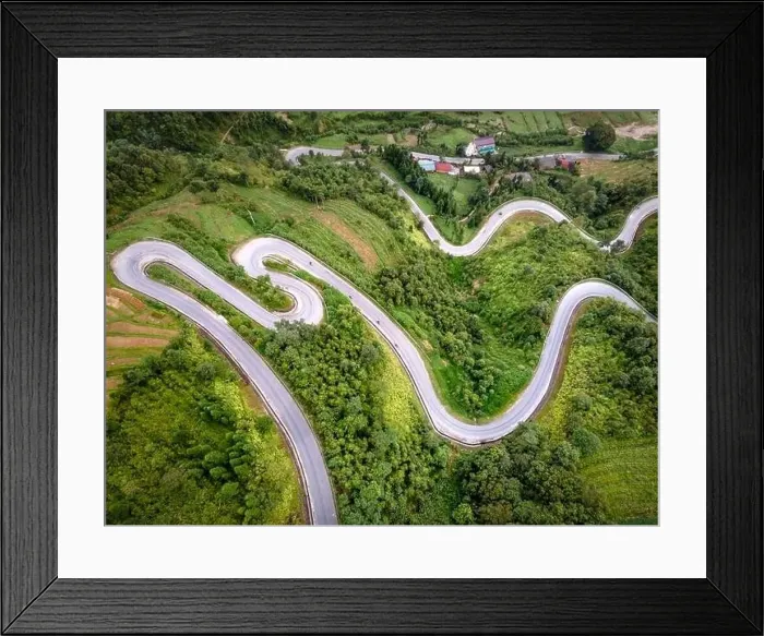 Framed Print : Doc Chin Khoanh is a mountain road with many consecutive U-shaped bends Framed Print : Doc Chin Khoanh is a mountain road with many consecutive U-shaped bends