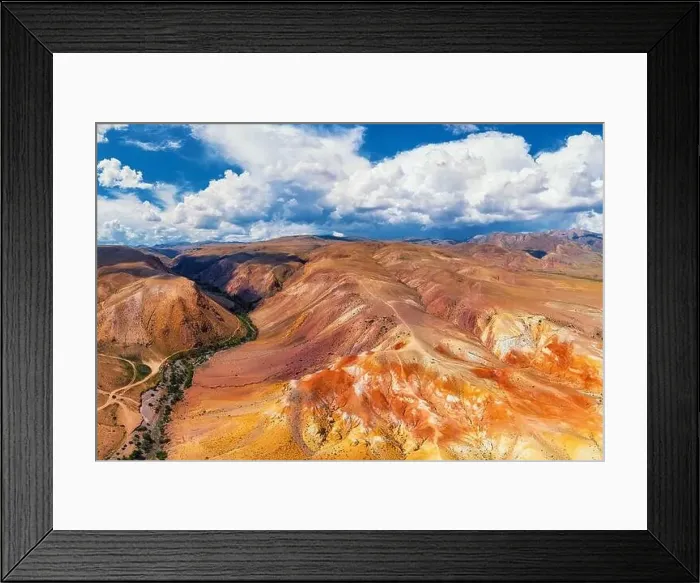 Framed Print : Aerial shot of the textured yellow nad red mountains resembling the surface of Mars Framed Print : Aerial shot of the textured yellow nad red mountains resembling the surface of Mars
