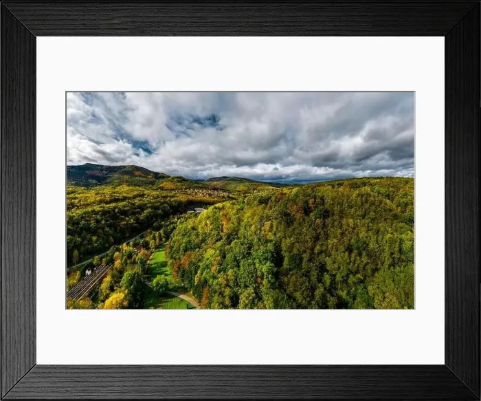 Framed Print : A drone rises above a multi-colored valley in the Vosges Framed Print : A drone rises above a multi-colored valley in the Vosges
