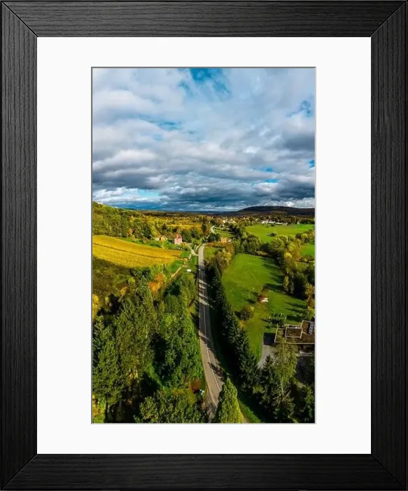 Framed Print : A drone rises above a multi-colored valley in the Vosges Framed Print : A drone rises above a multi-colored valley in the Vosges