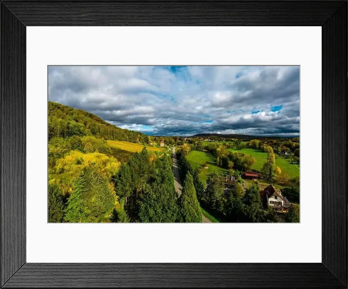 Framed Print : A drone rises above a multi-colored valley in the Vosges Framed Print : A drone rises above a multi-colored valley in the Vosges