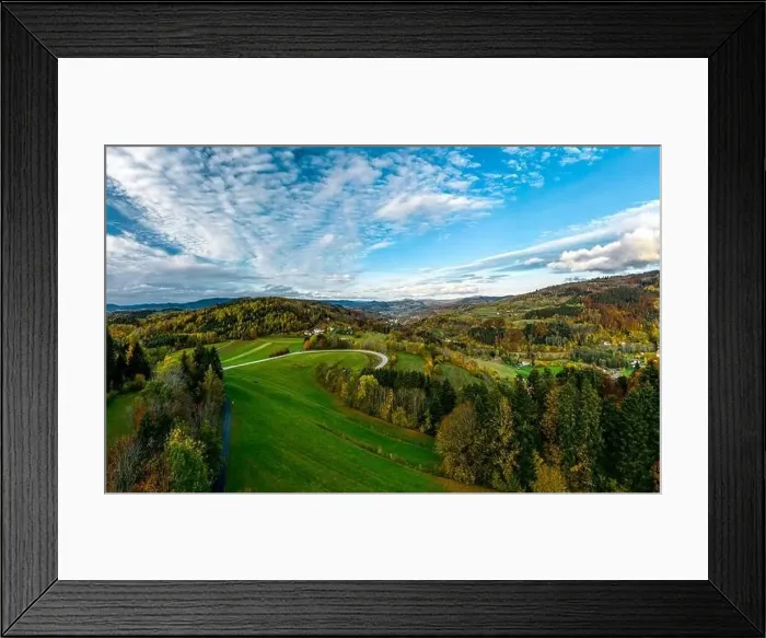 Framed Print : A drone rises above a multi-colored valley in the Vosges Framed Print : A drone rises above a multi-colored valley in the Vosges