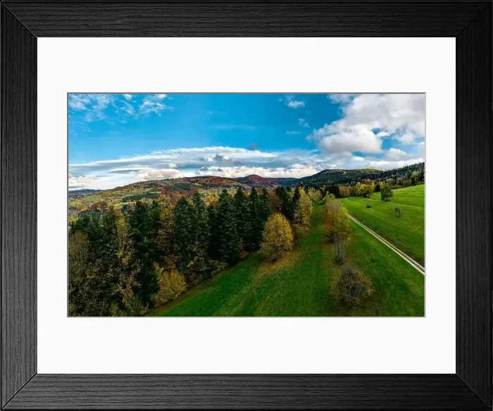 Framed Print : A drone rises above a multi-colored valley in the Vosges Framed Print : A drone rises above a multi-colored valley in the Vosges