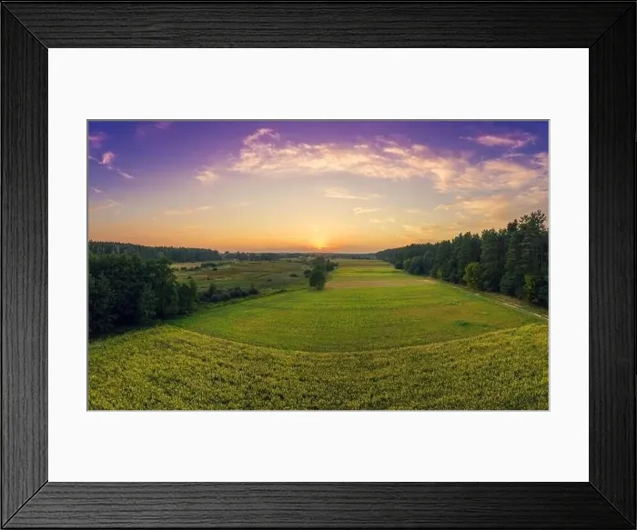 Framed Print : Rural landscape in the evening with a beautiful burning sky Framed Print : Rural landscape in the evening with a beautiful burning sky