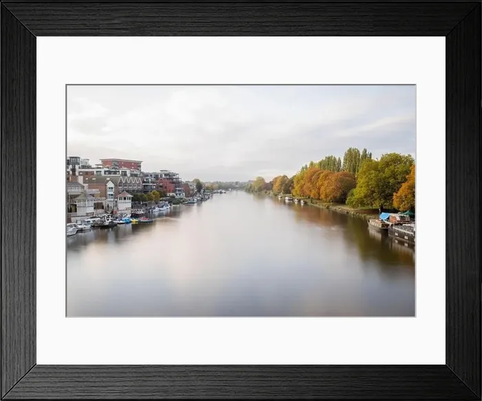 Framed Print : Aerial Landscape View Over a River in the Middle of a Town and a Forest Framed Print : Aerial Landscape View Over a River in the Middle of a Town and a Forest