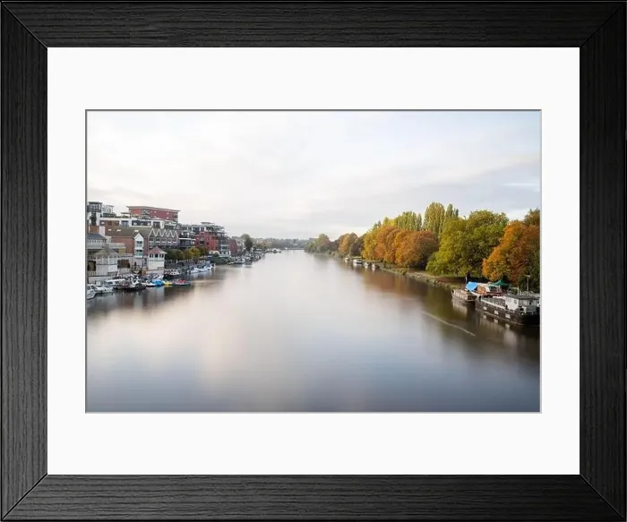 Framed Print : Aerial Landscape View Over a River in the Middle of a Town and a Forest Framed Print : Aerial Landscape View Over a River in the Middle of a Town and a Forest