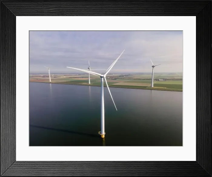 Framed Print : offshore windmill park with clouds and a blue sky, windmill park in the ocean drone aerial view with wind turbine Framed Print : offshore windmill park with clouds and a blue sky, windmill park in the ocean drone aerial view with wind turbine