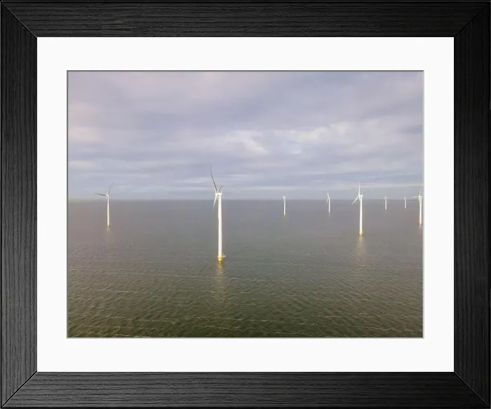 Framed Print : offshore windmill park with clouds and a blue sky, windmill park in the ocean drone aerial view with wind turbine Framed Print : offshore windmill park with clouds and a blue sky, windmill park in the ocean drone aerial view with wind turbine