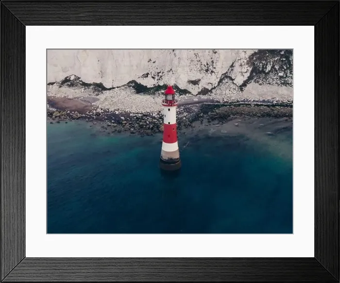 Framed Print : Aerial Drone Landscape photo of a Beachy Head Lighthouse and chalk cliffs at colorful sunrise with low tide in England Framed Print : Aerial Drone Landscape photo of a Beachy Head Lighthouse and chalk cliffs at colorful sunrise with low tide in England
