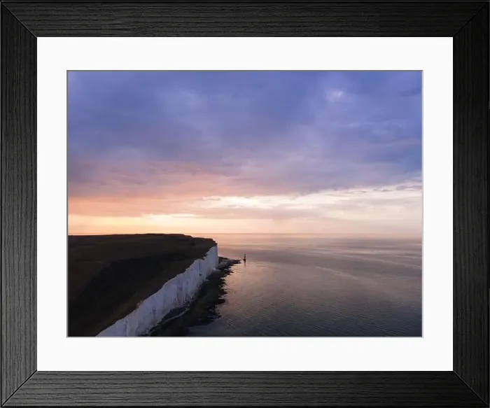 Framed Print : Aerial Drone Landscape photo of a Beachy Head Lighthouse and chalk cliffs at colorful sunrise with low tide in England Framed Print : Aerial Drone Landscape photo of a Beachy Head Lighthouse and chalk cliffs at colorful sunrise with low tide in England