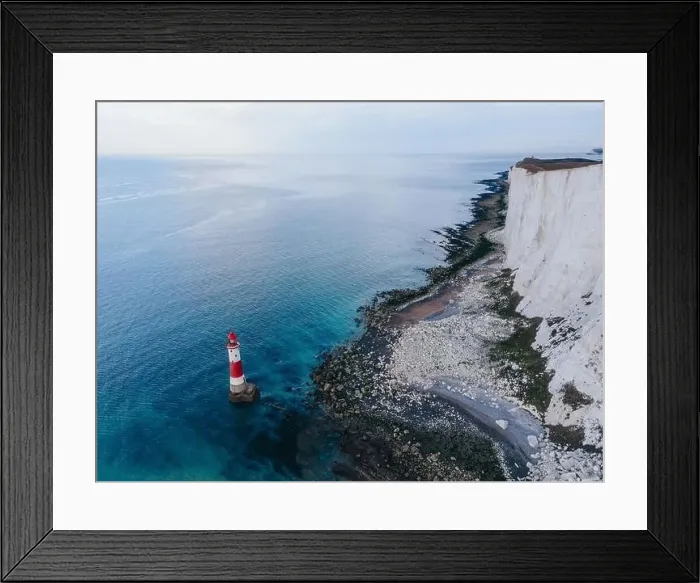 Framed Print : Aerial Drone Landscape photo of a Beachy Head Lighthouse and chalk cliffs at colorful sunrise with low tide in England Framed Print : Aerial Drone Landscape photo of a Beachy Head Lighthouse and chalk cliffs at colorful sunrise with low tide in England
