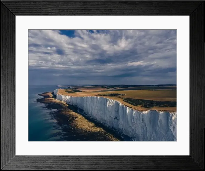Framed Print : Aerial Drone Landscape photo of a Beachy Head Lighthouse and chalk cliffs at colorful sunrise with low tide in England Framed Print : Aerial Drone Landscape photo of a Beachy Head Lighthouse and chalk cliffs at colorful sunrise with low tide in England