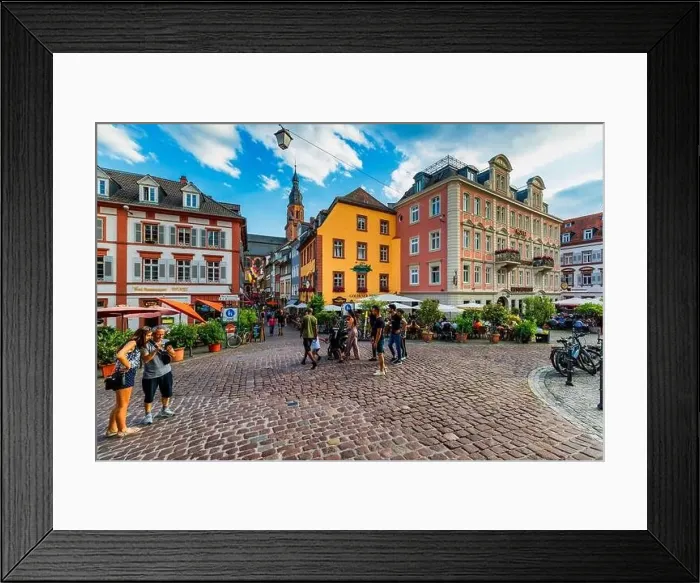 Framed Print : Heidelber, Germany - July 6, 2019: Marketplace crowded with tourists and Town Hall in Heidelberg in Germany Framed Print : Heidelber, Germany - July 6, 2019: Marketplace crowded with tourists and Town Hall in Heidelberg in Germany