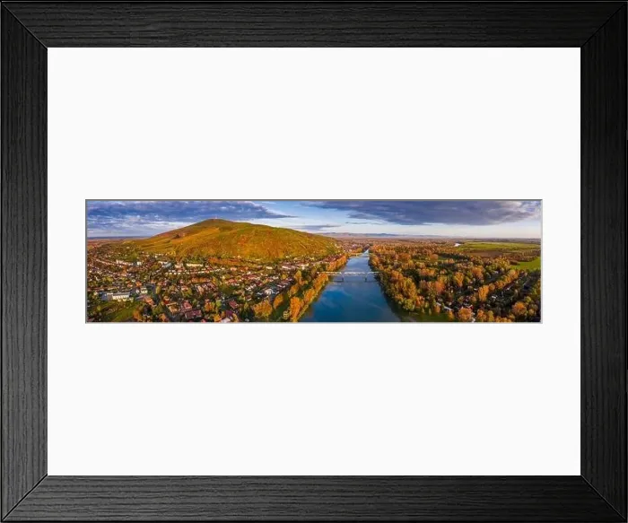 Framed Print : Tokaj, Hungary - Ultra wide aerial panoramic view of the small town of Tokaj with golden vineyards on the hills of wine Framed Print : Tokaj, Hungary - Ultra wide aerial panoramic view of the small town of Tokaj with golden vineyards on the hills of wine