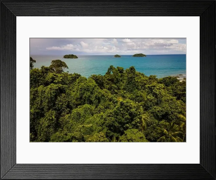 Framed Print : Uninhabited Tropical Island with ocean and more islands in distance Framed Print : Uninhabited Tropical Island with ocean and more islands in distance