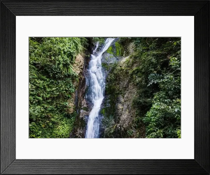 Framed Print : waterfall in the middle of the tropical jungle Framed Print : waterfall in the middle of the tropical jungle