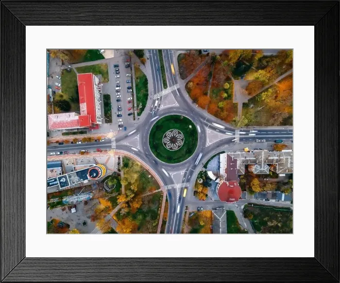 Framed Print : Aerial view of roundabout road with circular cars in small european city at autumn cloudy day, Kyiv region, Ukraine Framed Print : Aerial view of roundabout road with circular cars in small european city at autumn cloudy day, Kyiv region, Ukraine