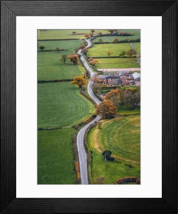 Framed Print : Vertical image long windy road cutting through English Countryside in Cheshire Framed Print : Vertical image long windy road cutting through English Countryside in Cheshire