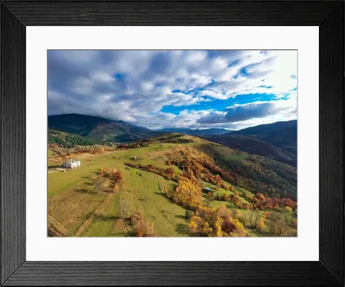 Framed Print : Sky with white and fluffy layer of clouds over green autumn hills, Aerial panoramic drone shot Framed Print : Sky with white and fluffy layer of clouds over green autumn hills, Aerial panoramic drone shot