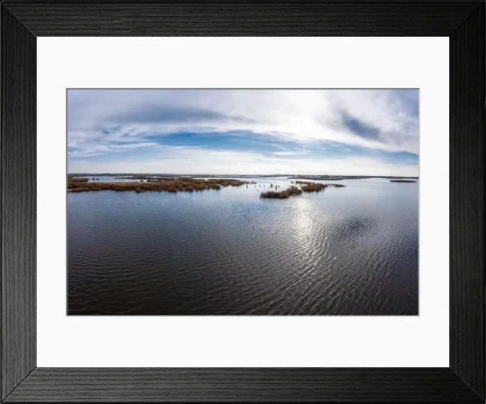 Framed Print : Bird's-eye view of the beautiful Samarskie Plavni in the warm evening light in Ukraine. Aerial panoramic drone shot Framed Print : Bird's-eye view of the beautiful Samarskie Plavni in the warm evening light in Ukraine. Aerial panoramic drone shot