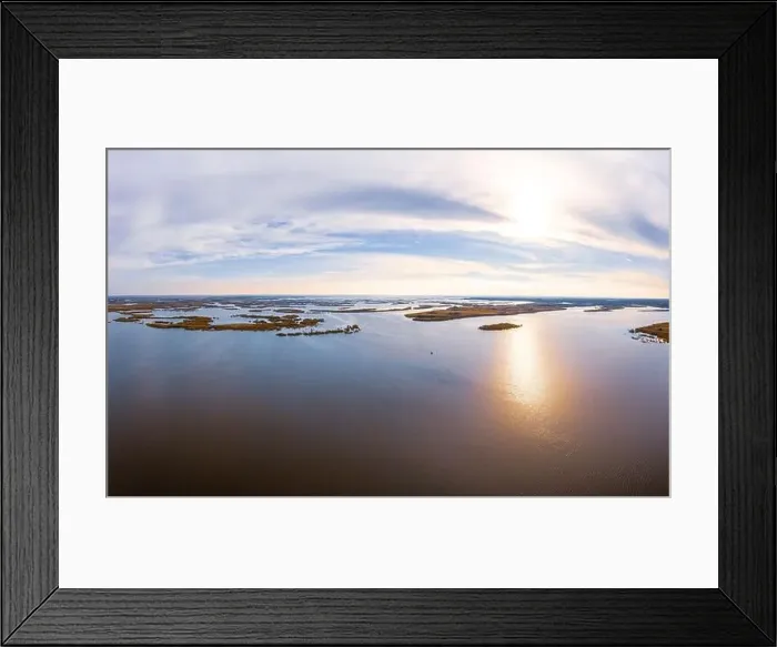 Framed Print : Bird's-eye view of the beautiful Samarskie Plavni in the warm evening light in Ukraine. Aerial panoramic drone shot Framed Print : Bird's-eye view of the beautiful Samarskie Plavni in the warm evening light in Ukraine. Aerial panoramic drone shot