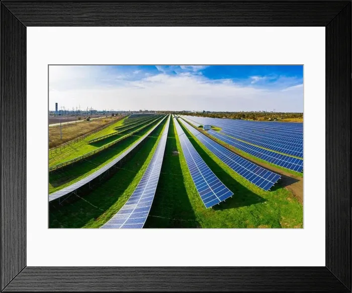 Framed Print : Huge solar power plant to use solar energy in a picturesque green field in Ukraine. Aerial panoramic drone shot Framed Print : Huge solar power plant to use solar energy in a picturesque green field in Ukraine. Aerial panoramic drone shot