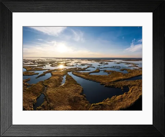 Framed Print : Bird's-eye view of the beautiful Samarskie Plavni in the warm evening light in Ukraine. Aerial panoramic drone shot Framed Print : Bird's-eye view of the beautiful Samarskie Plavni in the warm evening light in Ukraine. Aerial panoramic drone shot