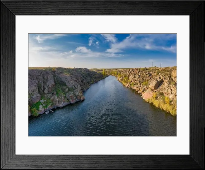 Framed Print : A stream flowing among huge stones covered with small dry plants in the warm evening light in picturesque Ukraine Framed Print : A stream flowing among huge stones covered with small dry plants in the warm evening light in picturesque Ukraine