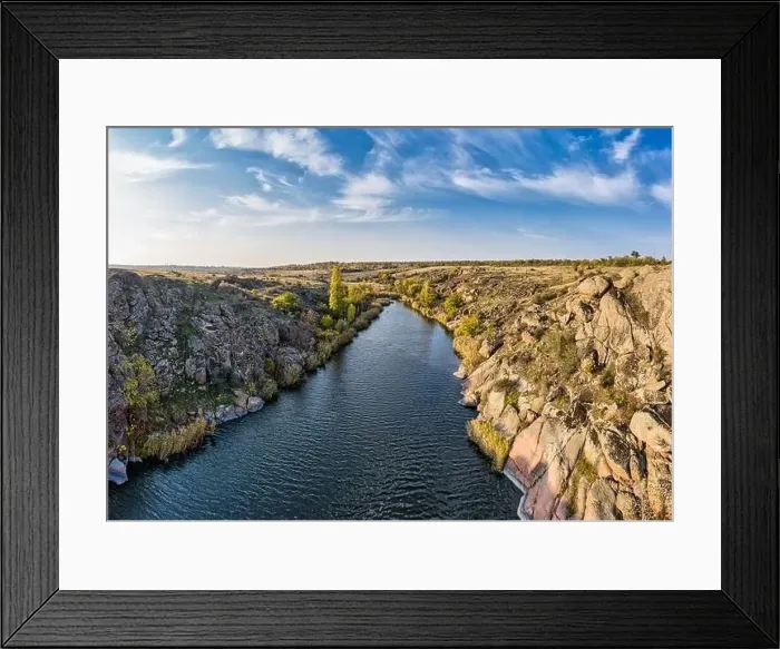 Framed Print : A stream flowing among huge stones covered with small dry plants in the warm evening light in picturesque Ukraine Framed Print : A stream flowing among huge stones covered with small dry plants in the warm evening light in picturesque Ukraine