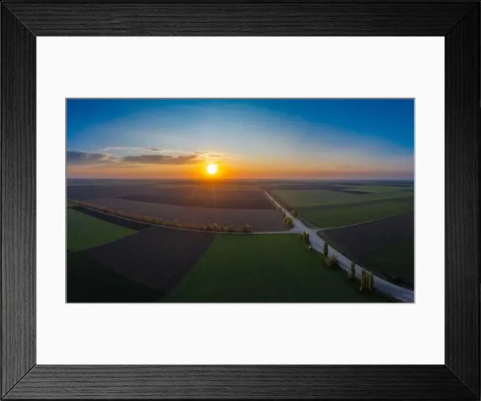 Framed Print : Flying over a field of growing wheat. Aerial panoramic drone shot Framed Print : Flying over a field of growing wheat. Aerial panoramic drone shot