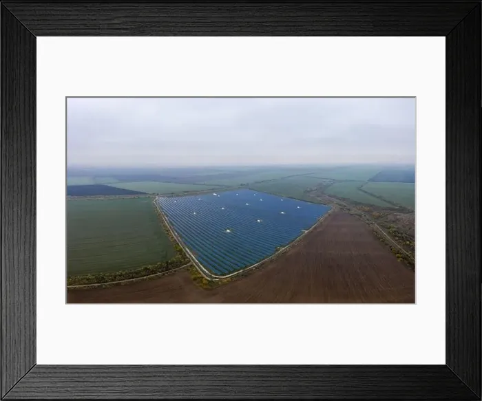 Framed Print : Power plant using renewable solar energy. Aerial drone shot Framed Print : Power plant using renewable solar energy. Aerial drone shot
