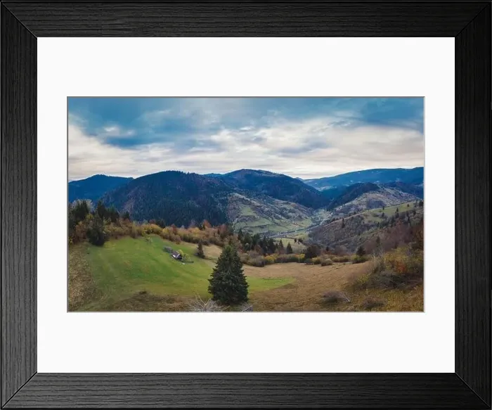 Framed Print : Small village in a mountain valley of the Carpathian Mountains on an autumn day in Ukraine in the village of Dzembronya Framed Print : Small village in a mountain valley of the Carpathian Mountains on an autumn day in Ukraine in the village of Dzembronya