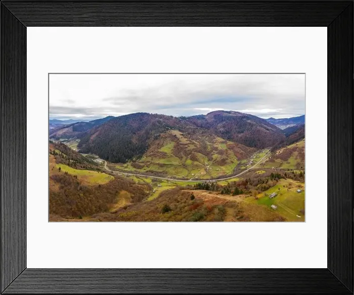 Framed Print : Small village in a mountain valley of the Carpathian Mountains on an autumn day in Ukraine along a road Framed Print : Small village in a mountain valley of the Carpathian Mountains on an autumn day in Ukraine along a road