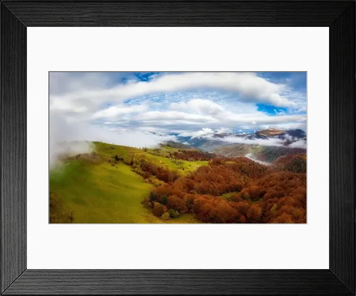 Framed Print : Sky with white and fluffy layer of clouds over green autumn hills, Aerial panoramic drone shot Framed Print : Sky with white and fluffy layer of clouds over green autumn hills, Aerial panoramic drone shot