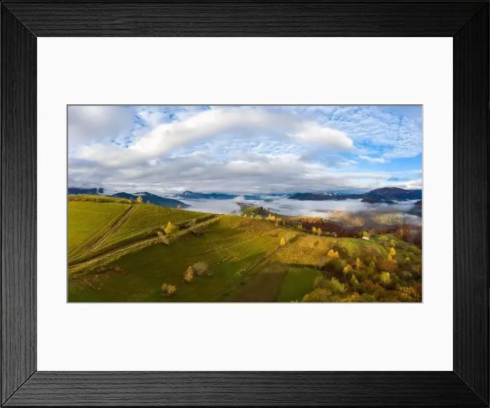 Framed Print : Autumn flight through blue sky in Carpatian autumn mountains, Aerial panoramic drone shot Framed Print : Autumn flight through blue sky in Carpatian autumn mountains, Aerial panoramic drone shot