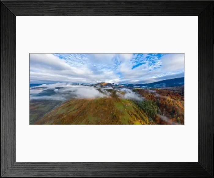 Framed Print : Sky with white and fluffy layer of clouds over green autumn hills, Aerial panoramic drone shot Framed Print : Sky with white and fluffy layer of clouds over green autumn hills, Aerial panoramic drone shot