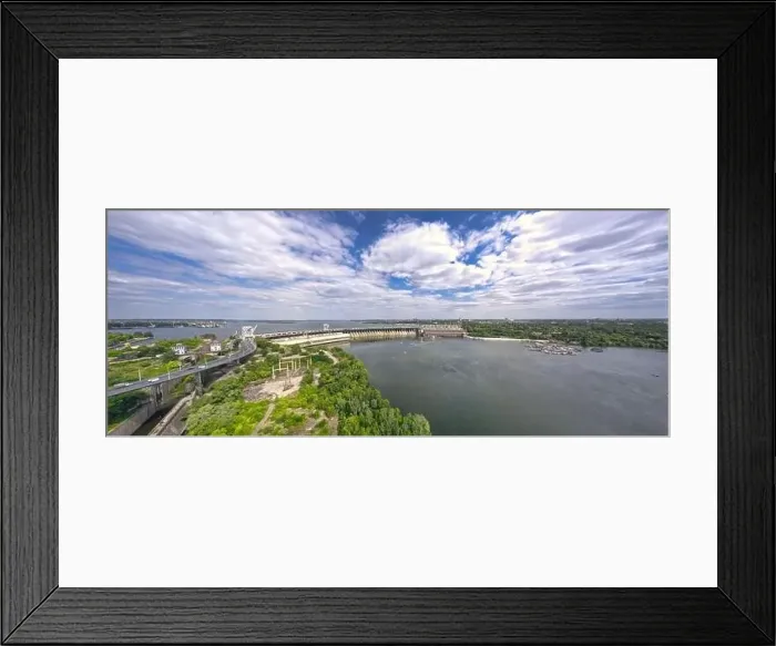 Framed Print : The beautiful river is surrounded by green and fresh vegetation in the city Framed Print : The beautiful river is surrounded by green and fresh vegetation in the city