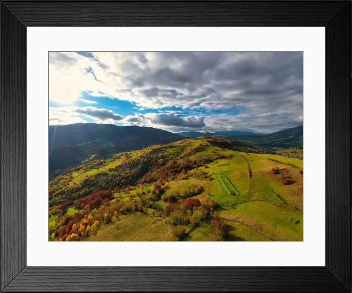 Framed Print : Sky with white and fluffy layer of clouds over green autumn hills, Aerial panoramic drone shot Framed Print : Sky with white and fluffy layer of clouds over green autumn hills, Aerial panoramic drone shot