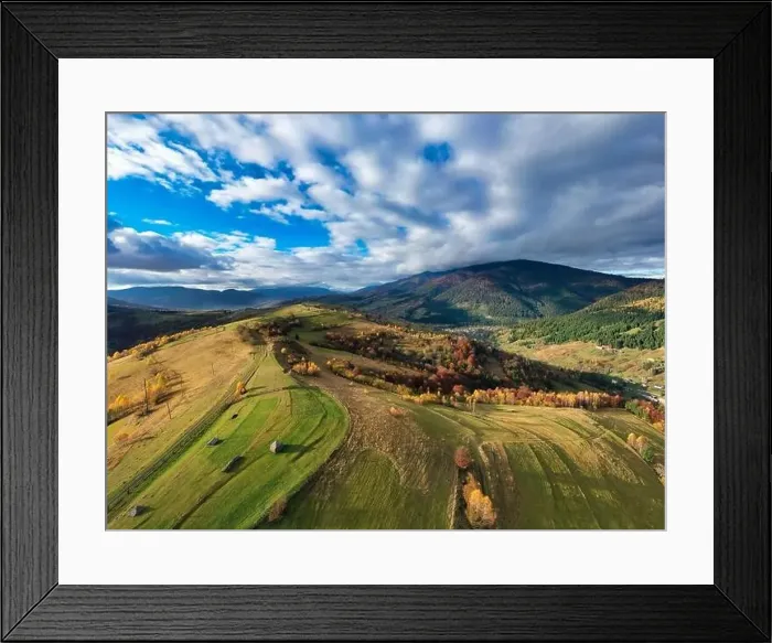 Framed Print : Sky with white and fluffy layer of clouds over green autumn hills, Aerial panoramic drone shot Framed Print : Sky with white and fluffy layer of clouds over green autumn hills, Aerial panoramic drone shot